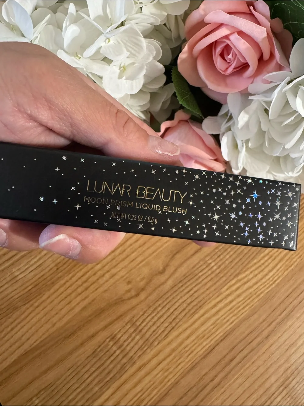 Lunar Beauty Moon prism liquid blush in fuego fuchsia